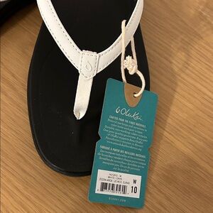 OluKai Women's Sandals in White and Black